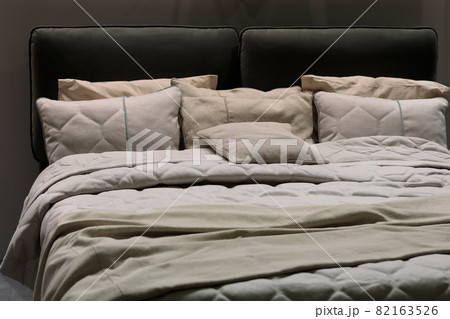 double bed with linen bedding and pillows 82163526
