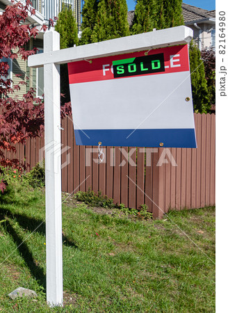 Real Estate Sold and House For Sale Sign on the Post Real Estate Sold and House For Sale Sign on the Post 82164980