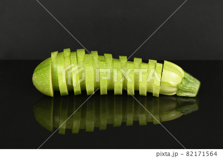 Zucchini isolated on acrylic black background. 82171564