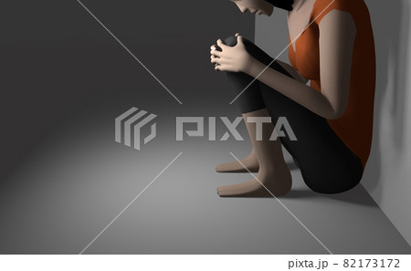 壁際で悲しむ女性のイメージ 82173172