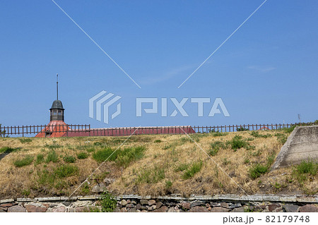 Priozersk, Russia - July 10, 2021: Tower and rampart of Korela fortress in the city of Priozersk, Leningrad region, built in XIII - XIV centuries Priozersk, Russia - July 10, 2021: Tower and rampart of Korela fortress in the city of Priozersk, Leningrad region, built in XIII - XIV centuries 82179748