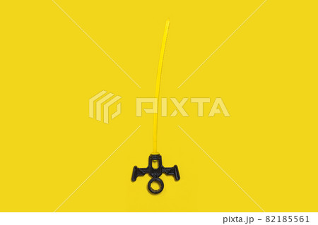 small toy for children on the yellow background 82185561