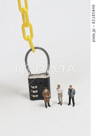 an mini of figure with padlock and chain an mini of figure with padlock and chain 82185849