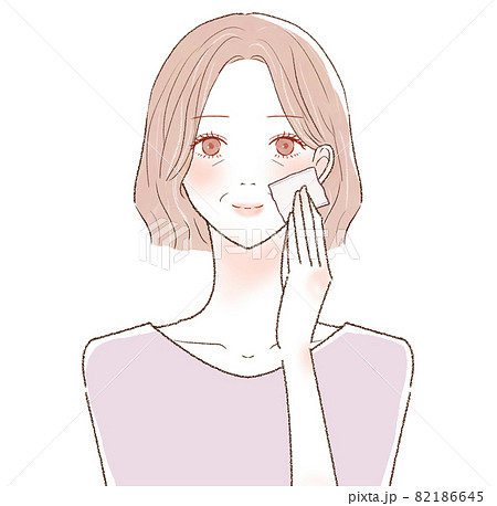 あぶらとり紙で顔の皮脂を取る中年女性 82186645