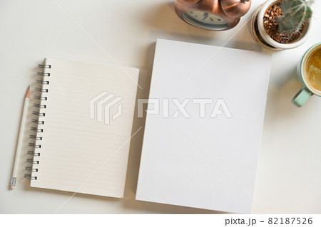 Blank book cover and notepads for text display on white background 82187526