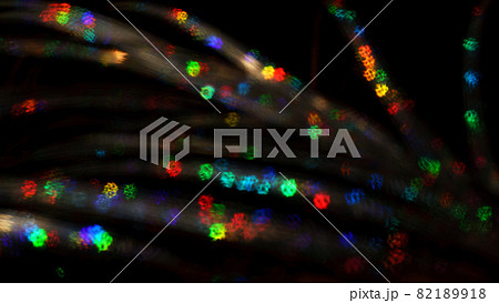 Christmas background. Festive abstract background with bokeh defocused lights and stars 82189918