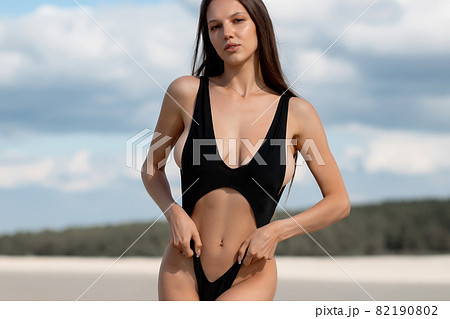 Sensual woman in bikini on beach Sensual woman in bikini on beach 82190802