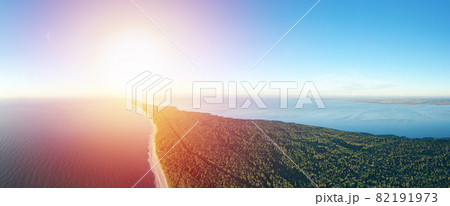 Curonian Spit wth Baltic sea coastline on sunset. Kurshskaya kosa national park near Zelenogradsk. Aerial view 82191973