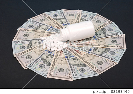 Pills spilling out of pill bottle 82193446