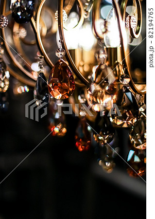 Crystal glass chandelier as home decor, interior design and luxury furniture detail, holiday invitation card background 82194765