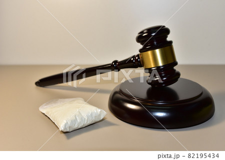 Cocaine and Judge hammer in courtroom.  82195434