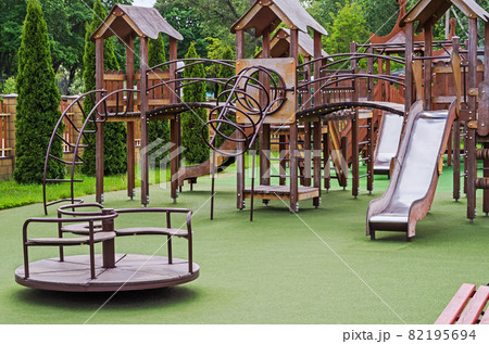 Childrens playground with many attractions made of wood and metal 82195694