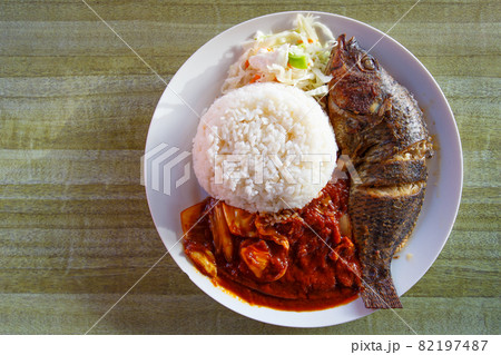 Tilapia fish, serve in Ghanaian style Tilapia fish, serve in Ghanaian style 82197487