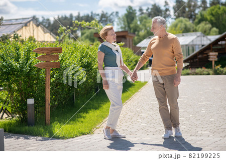 Romantic couple enjoying each other society during the morning walk 82199225