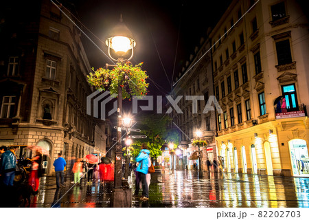 BELGRADE, SERBIA - SEPTEMBER 25: Rainy inght at Knez Mihailova Street on September 25, 2015 in Belgrade, Serbia. Street is the main shopping mile of Belgrade 82202703