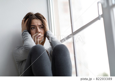 Despaired sad european millennial woman suffering from depression and psychological problems 82203389