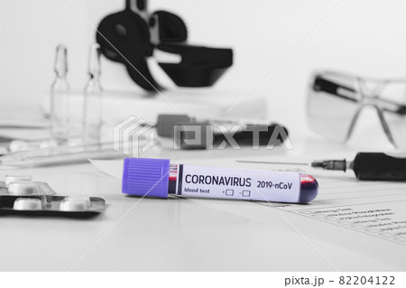 Coronavirus 2019-nCoV concept still life with blood test, drugs and laboratory flasks. COVID-19 background. Coronavirus 2019-nCoV concept still life with blood test, drugs and laboratory flasks. COVID-19 background. 82204122