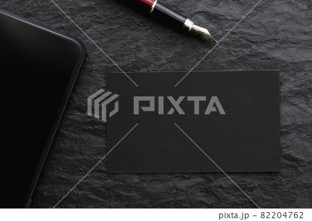 Blank black business card for mockup and vintage pen on dark background, luxury branding and corporate identity design Blank black business card for mockup and vintage pen on dark background, luxury branding and corporate identity design 82204762