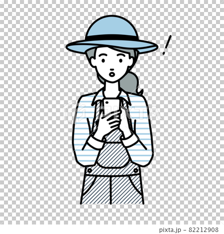 立ってスマートフォンを操作して何かに気づいて驚いた農家の女性 82212908