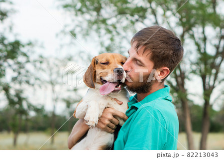 Portrait owner man with dog 82213043