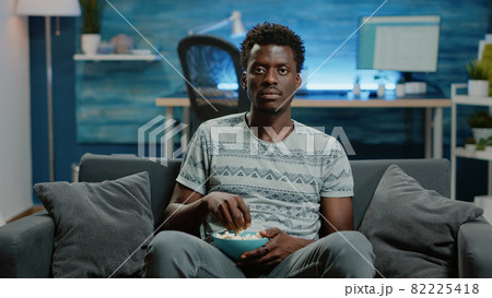 POV of person watching football game on television 82225418