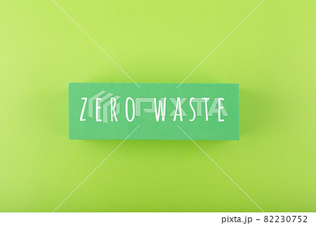 Modern composition with zero waste inscription against light green background Modern composition with zero waste inscription against light green background 82230752