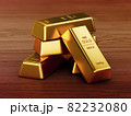 Gold bars on a wood floor 3d render. 82232080