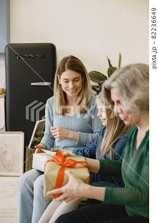 Family celebrating birthday in the kitchen 82236649
