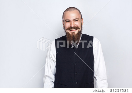 emotional man in suit on gray background emotional man in suit on gray background 82237582