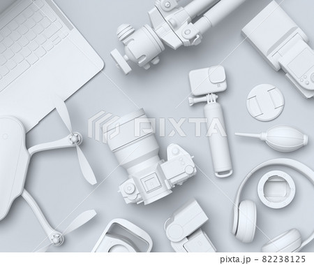 Top view of monochrome designer workspace and photography gear on black table Top view of monochrome designer workspace and photography gear on black table 82238125