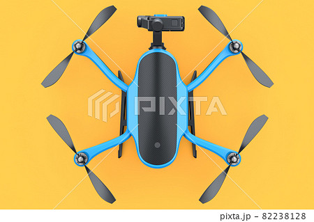 Flying photo and video drone or quad copter with action camera on orange 82238128