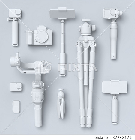 Top view of monochrome designer workspace and photography gear on black table 82238129