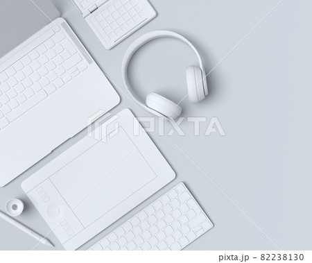 Top view of monochrome designer workspace and photography gear on black table 82238130