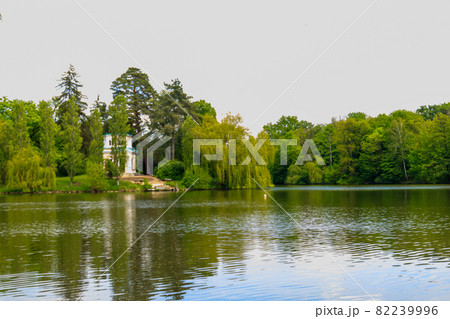 View of Upper Pond and Pink Pavilion on island of Anti-Circe (island of love) in Sofiyivka park in Uman, Ukraine 82239996