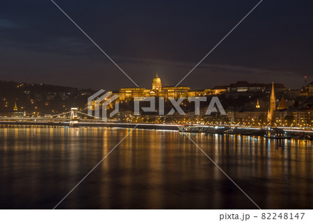 Danube river and illuminated historic boildings at night in Budapest, Hungary Danube river and illuminated historic boildings at night in Budapest, Hungary 82248147