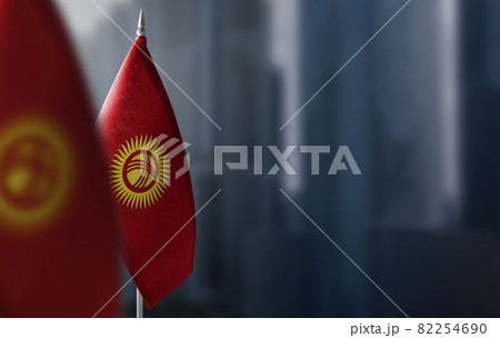 Small flags of Kirghizia on a blurry background of the city Small flags of Kirghizia on a blurry background of the city 82254690