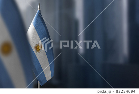 Small flags of Argentina on a blurry background of the city Small flags of Argentina on a blurry background of the city 82254694