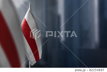 Small flags of Belarus on a blurry background of the city Small flags of Belarus on a blurry background of the city 82254697