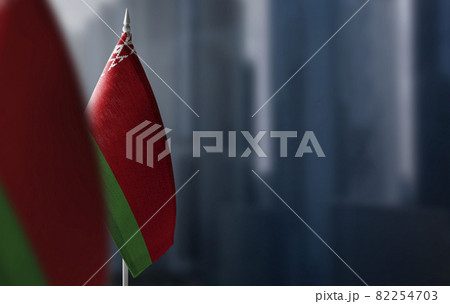 Small flags of Belarus on a blurry background of the city Small flags of Belarus on a blurry background of the city 82254703