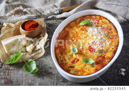 Tricolor bell pepper clafoutis (or gratin) with Parmesan cheese 82255545