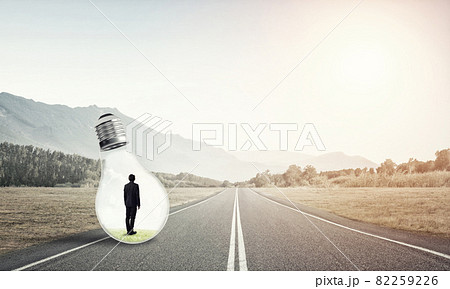 Businessman inside light bulb Businessman inside light bulb 82259226