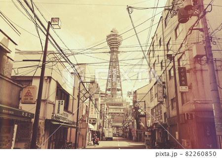 OSAKA ,JAPAN-APRIL 22 : Tsutenkaku Tower on April 22,2015 in Osaka. It is a tower and well-known landmark of Osaka, Japan and advertises Hitachi, located in the Shinsekai district of Naniwa-ku, Osaka. 82260850