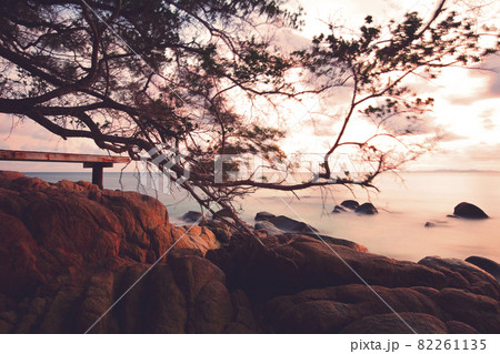 Amazing Twilight gold light at the Sea and beach on Munnok Island, Thailand. Amazing Twilight gold light at the Sea and beach on Munnok Island, Thailand. 82261135