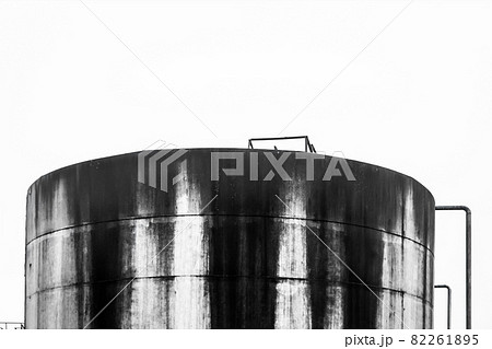 Old fuel oil tanks with smudges of fuel oil in an abandoned industrial plant Old fuel oil tanks with smudges of fuel oil in an abandoned industrial plant 82261895