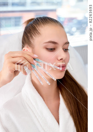 Close-up of procedure for face lifting PDO Suture operation, face lifting surgery for beautiful woman Close-up of procedure for face lifting PDO Suture operation, face lifting surgery for beautiful woman 82263693