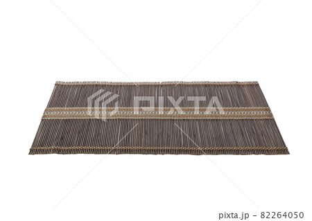 perspective view of isolated placemat for food. Close up of bamboo mat Empty space for your design 82264050