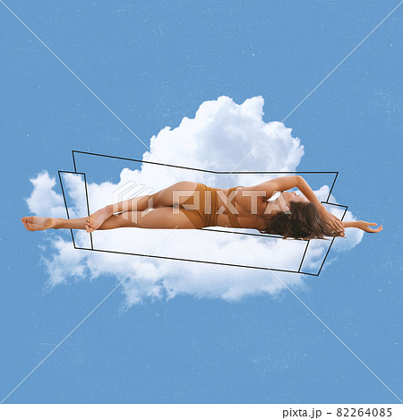 Contemporary artwork of tender woman lying on cloud in inner wear isolated over blue background. Fluffy cloudy bed 82264085