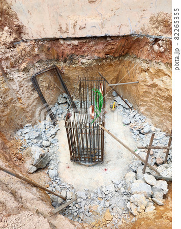 PENANG, MALAYSIA -SEPTEMBER 2, 2021: The process of cutting piles after the completion of building foundation piling work. This work needs to be done before the construction of the cap pile is proceed PENANG, MALAYSIA -SEPTEMBER 2, 2021: The process of cutting piles after the completion of building foundation piling work. This work needs to be done before the construction of the cap pile is proceed 82265355