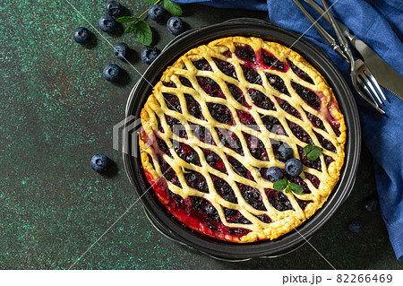 Homemade Berry pie. Sweet pie, tart with fresh blueberry. Delicious cake with blueberry. 82266469