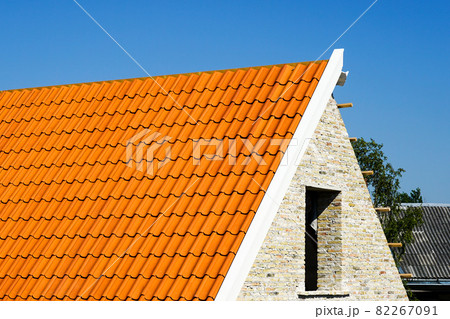 restoration of a historic brick house and replacement of roof clay tiles 82267091